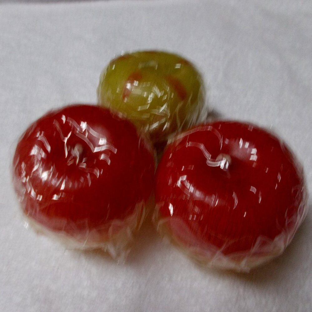 3 NWOT floating apple shaped candles